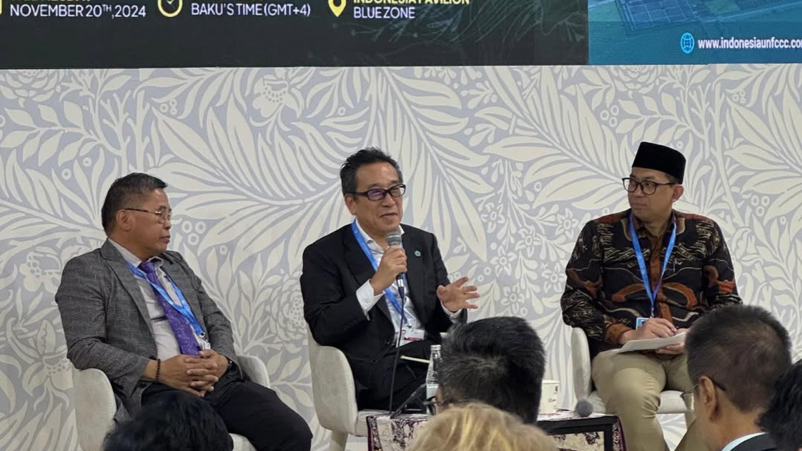 Yutaka Matsuzawa speaking at Indonesian Pavilion COP29 Azerbaijan with Alue Dohong and an Indonesian Representative