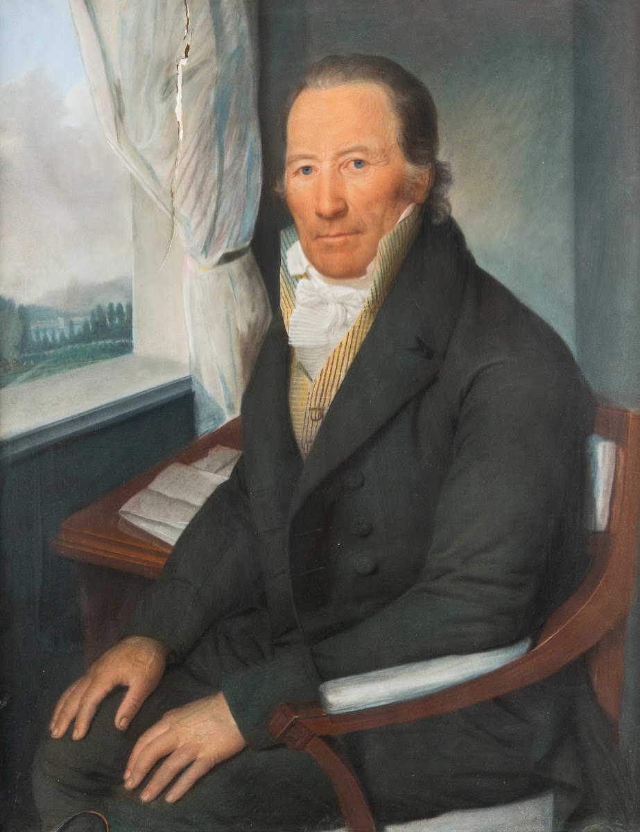 Portrait Of A Sitting Man Near A Window