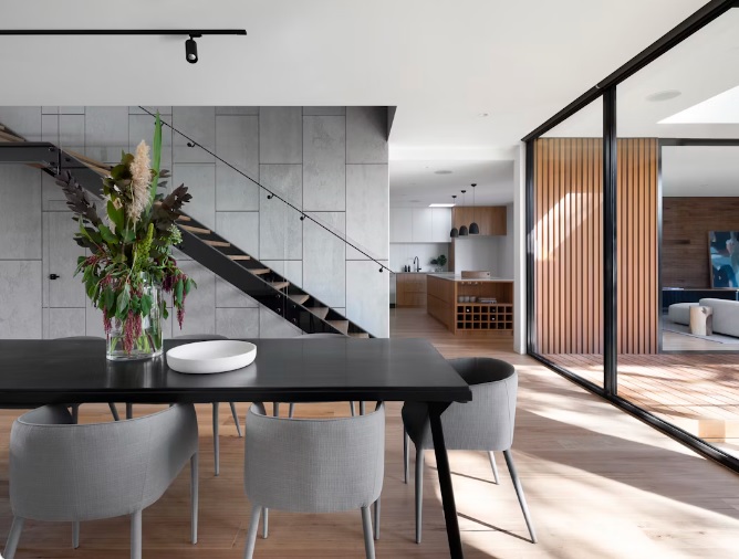 Contemporary dining space with clean lines and warm timber detailing
