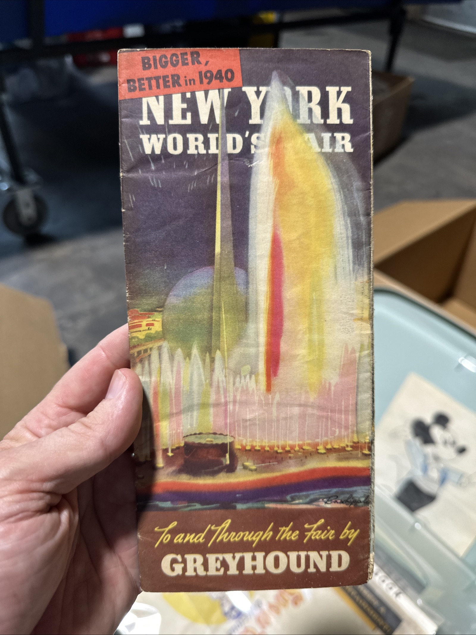 1940 Greyhound Lines travel brochure "To and Through the Fair," folded, showing Art Deco Lagoon of Nations cover with edge wear and center crease