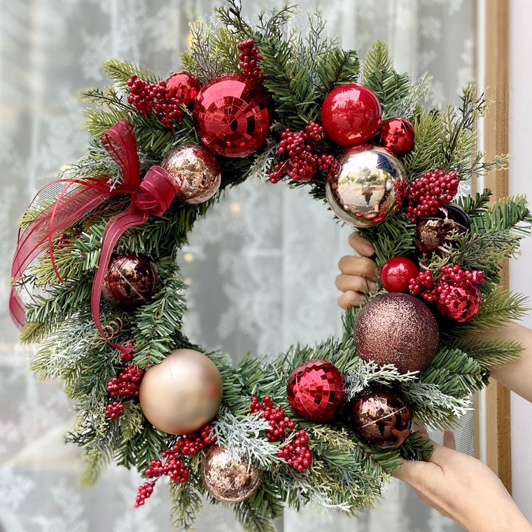 Illuminated Christmas wreath with LED light chain