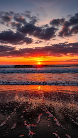 Dramatic Sunset Over Ocean Waves