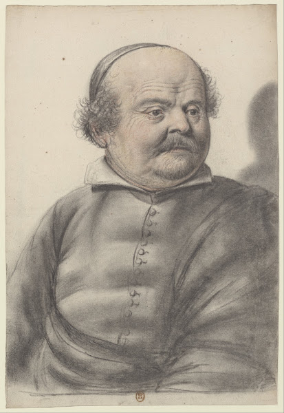 Homme au visage rond portant moustaches et royale coiffé dune calotte la tête de