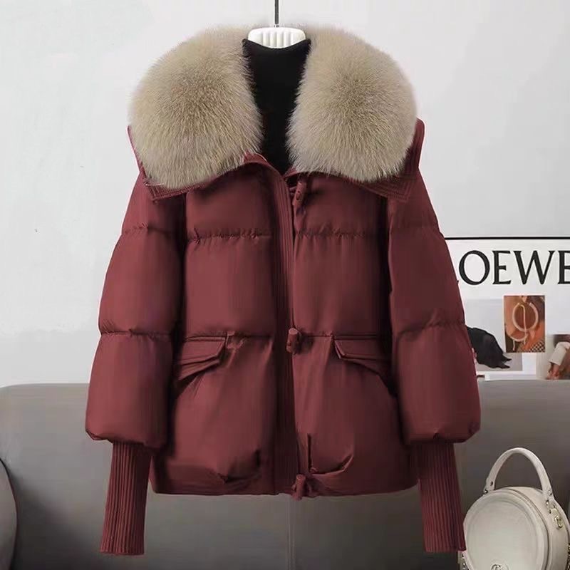 Short women's winter jacket with a large lapel collar