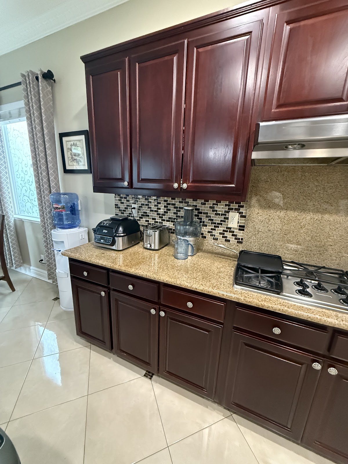 Kitchen range hood and cabinet wall