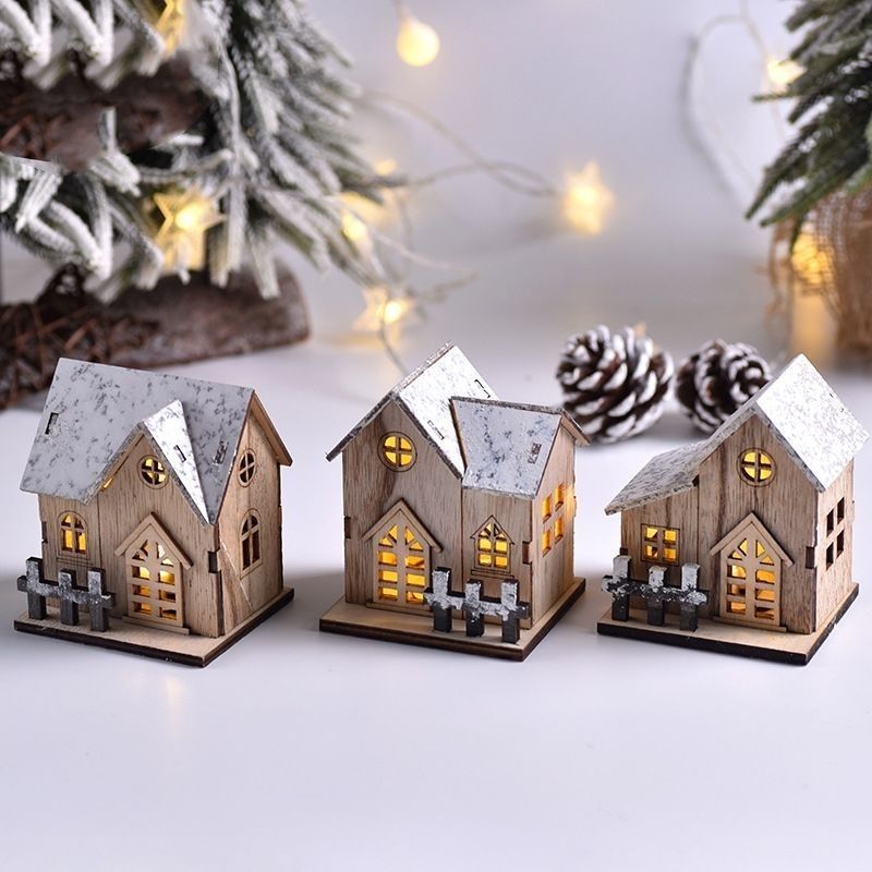 Beleuchtetes Holzhaus für die Weihnachtsdekoration