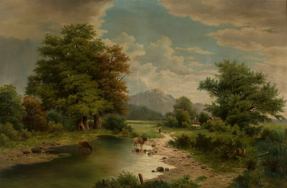 Landscape with cows at awater hole
