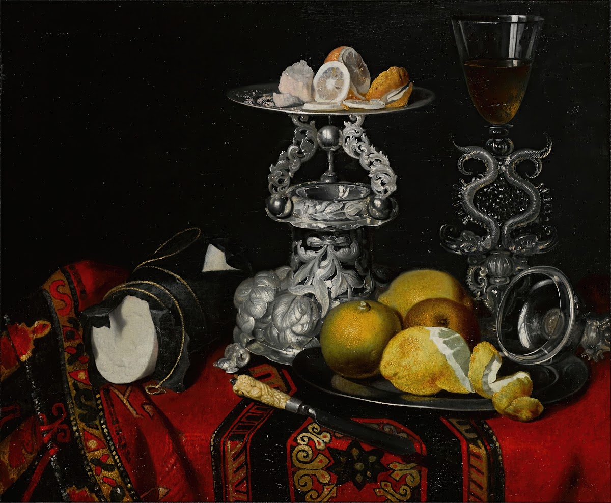 Still life with a façon de Venise serpent stemmed wine glass a silver vessel a b