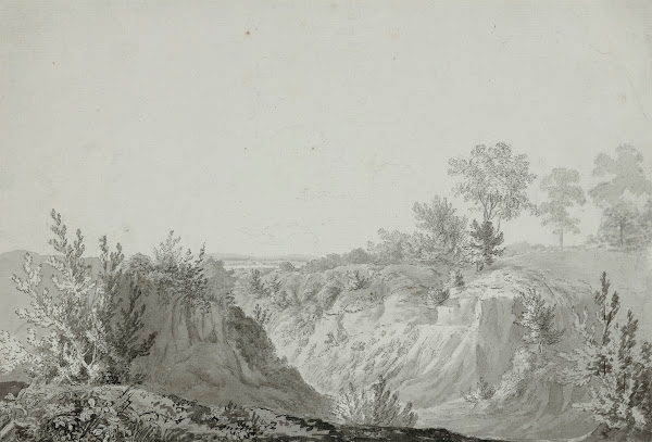 View of a valley with two figures seated on a path