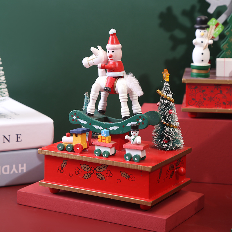 Christmas music box made of wood with carousel motif