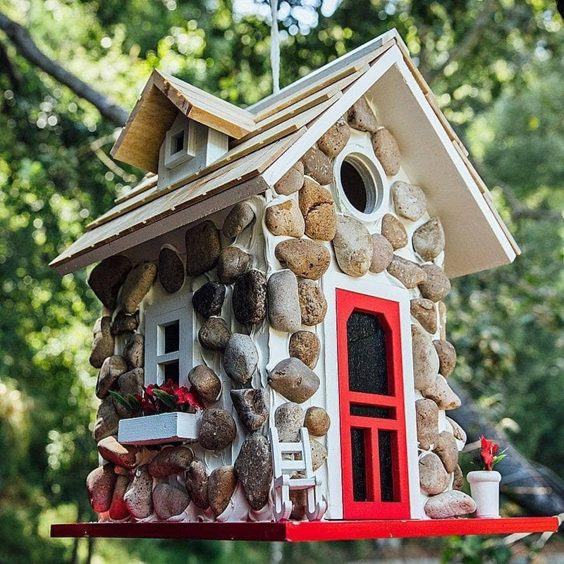 Decorative stone-look birdhouse made of resin