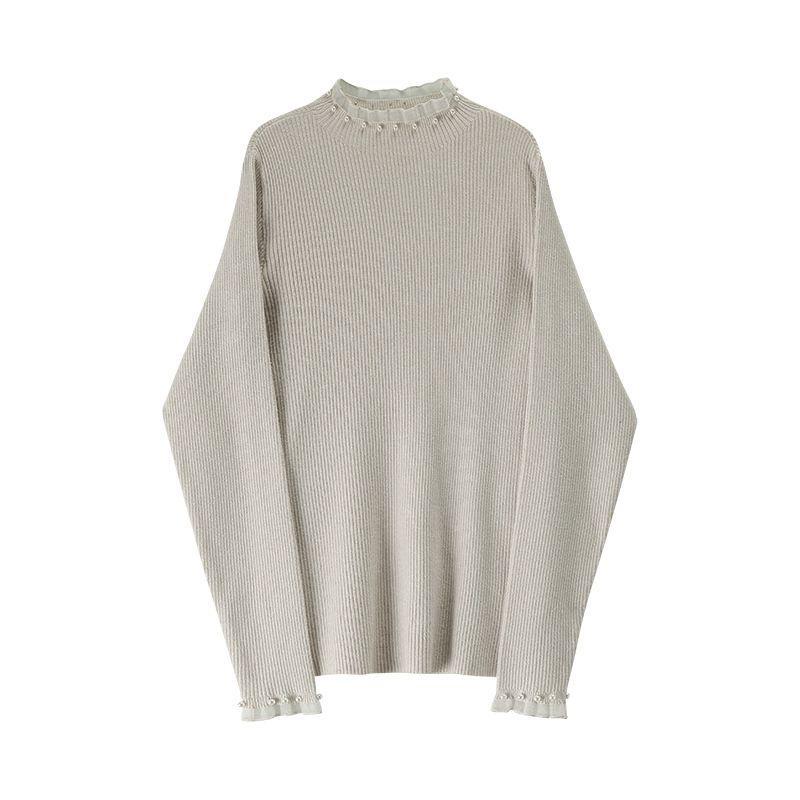 Women's knit sweater with standing collar and pearl details