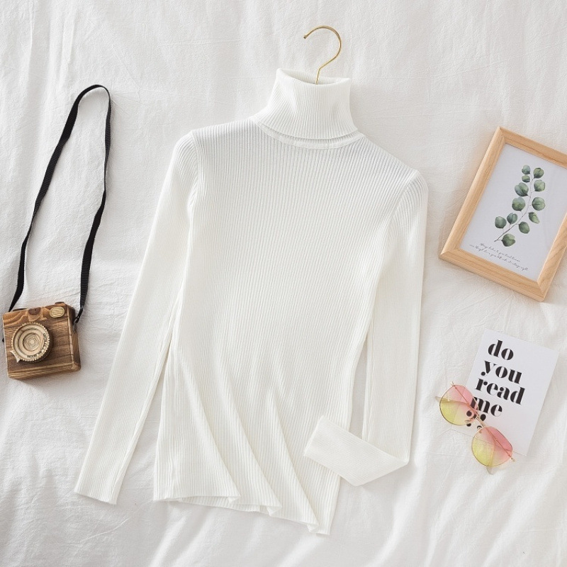 Women's knitted sweater with high collar, figure-hugging