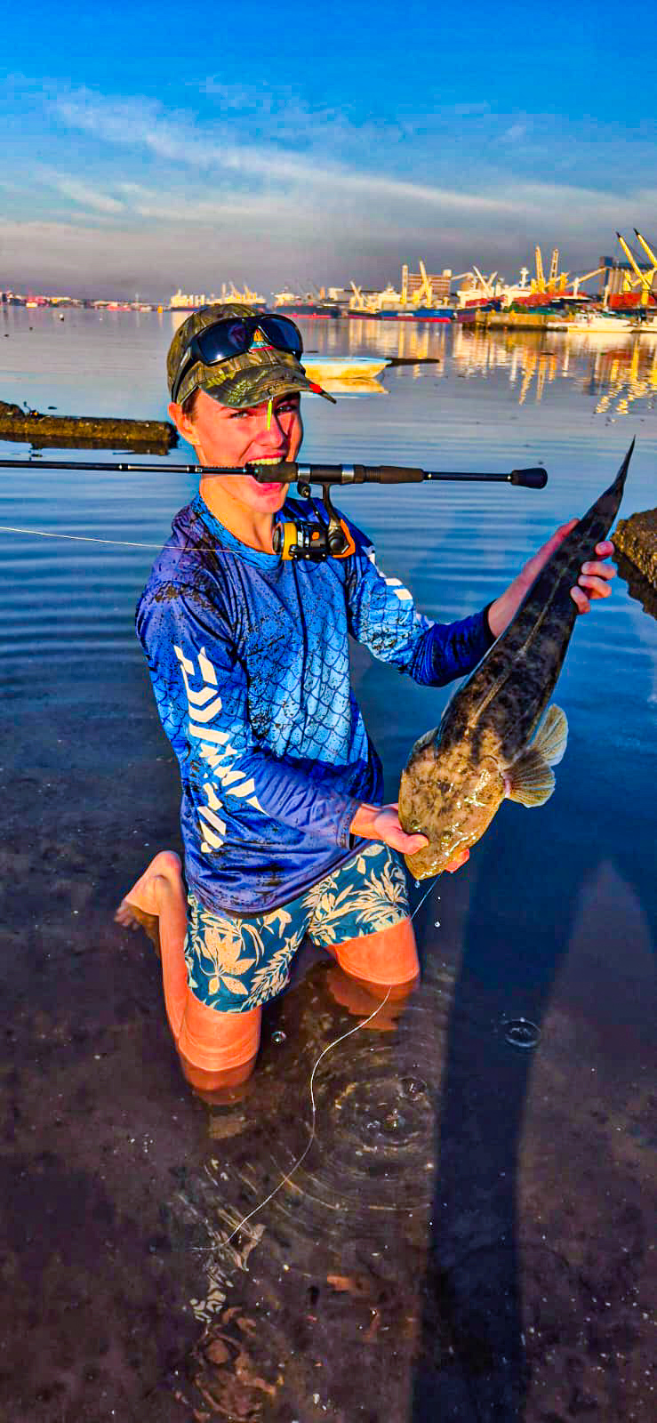 Jack Gillingwater with a Flounder caught on a lure from a local harbour