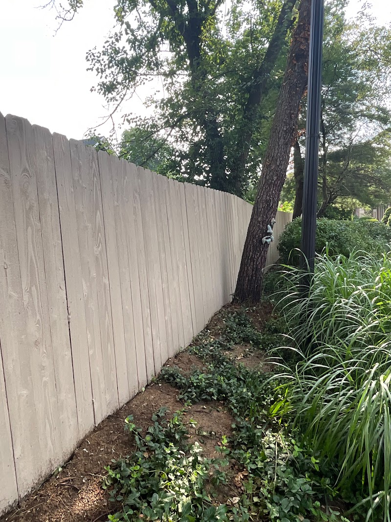 Roundtree north border fence after two coats of solid color stain, Indianapolis