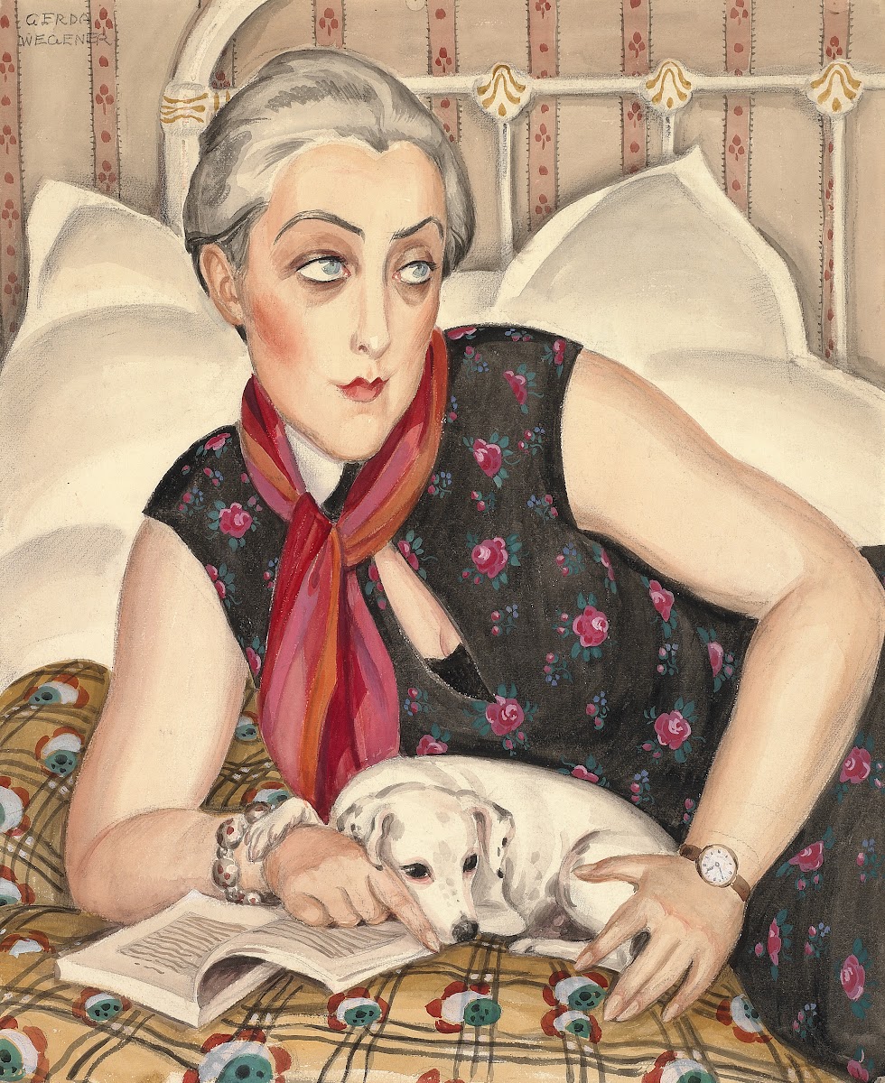 Portrait of a woman reading with a dog