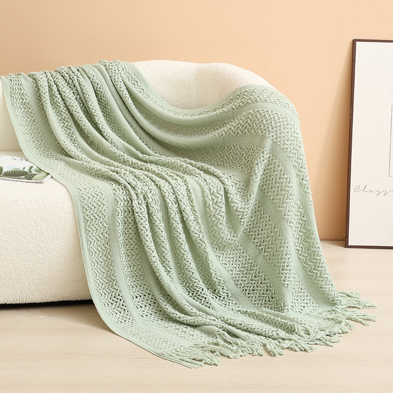 Decorative knitted blanket with fringes