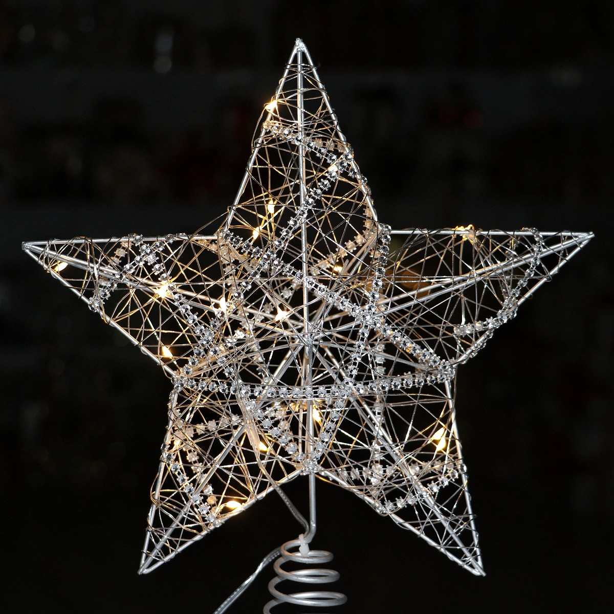 Christmas tree star topper made of iron, illuminated