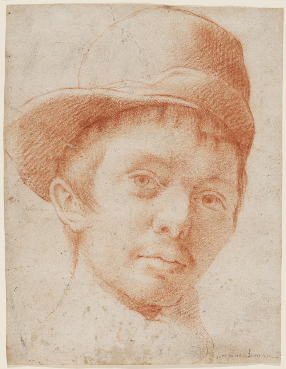 A boy wearing a workmans hat ca 1600