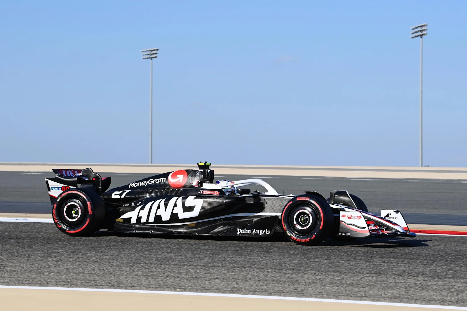 Haas F1 Team Race Car - Sports Photography 4K Wallpaper (4000x2666)
