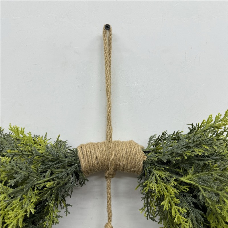 Heart-shaped Christmas wreath with bells