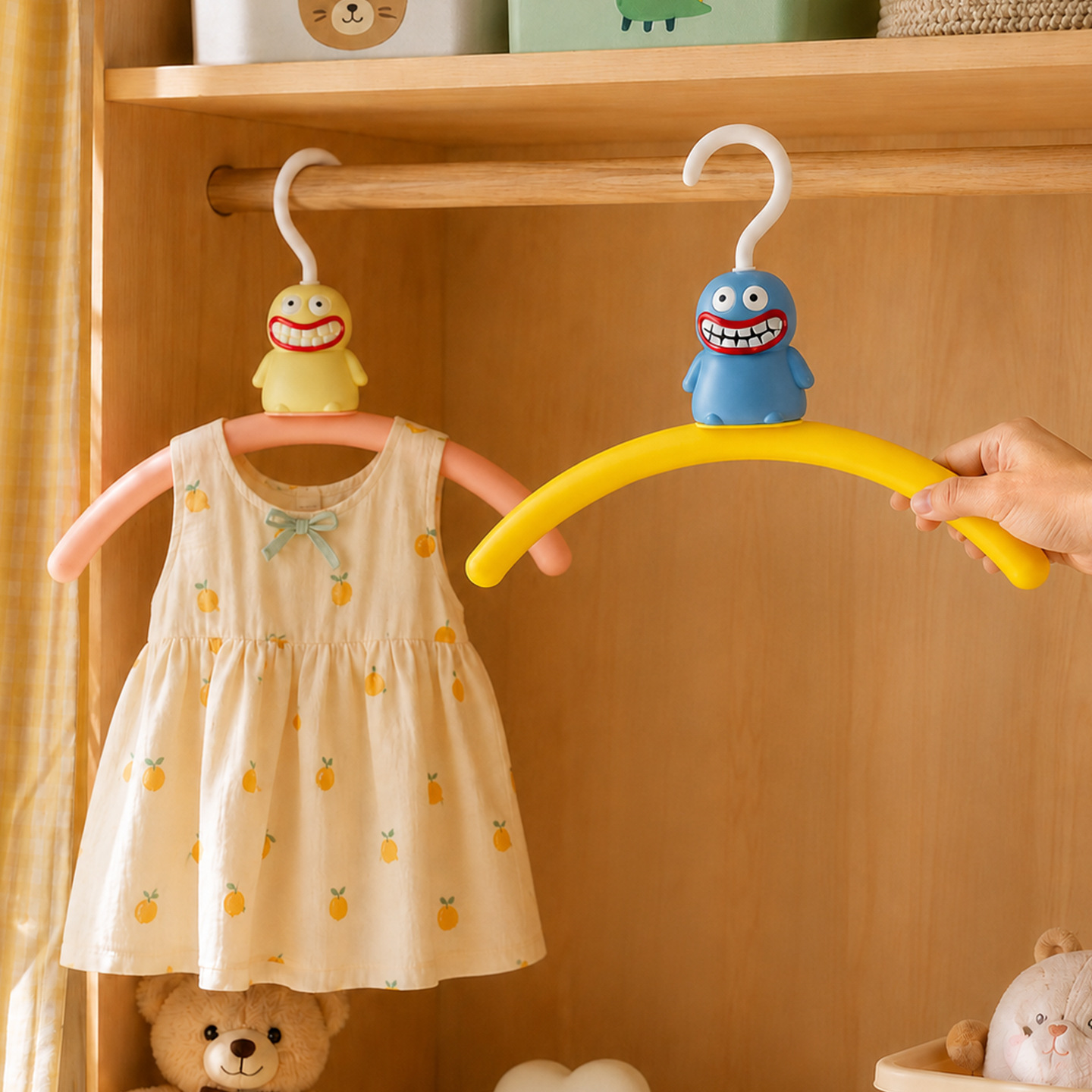 Plastic hanger with monster design