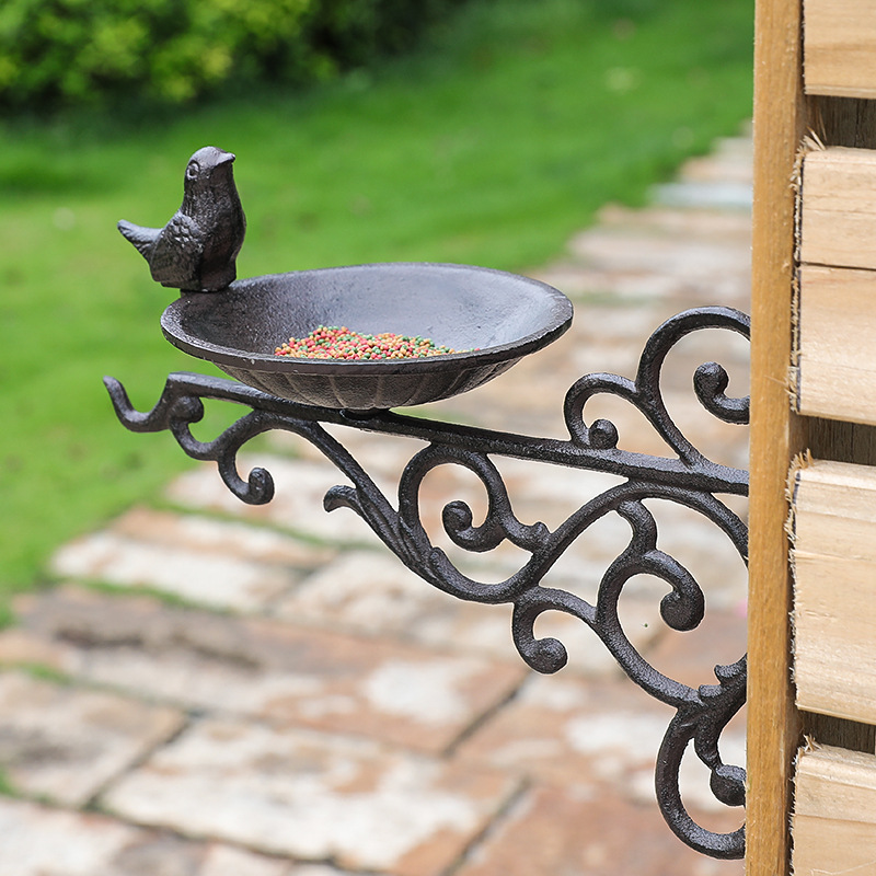 Decorative wall-mounted birdbath made of cast iron in European style
