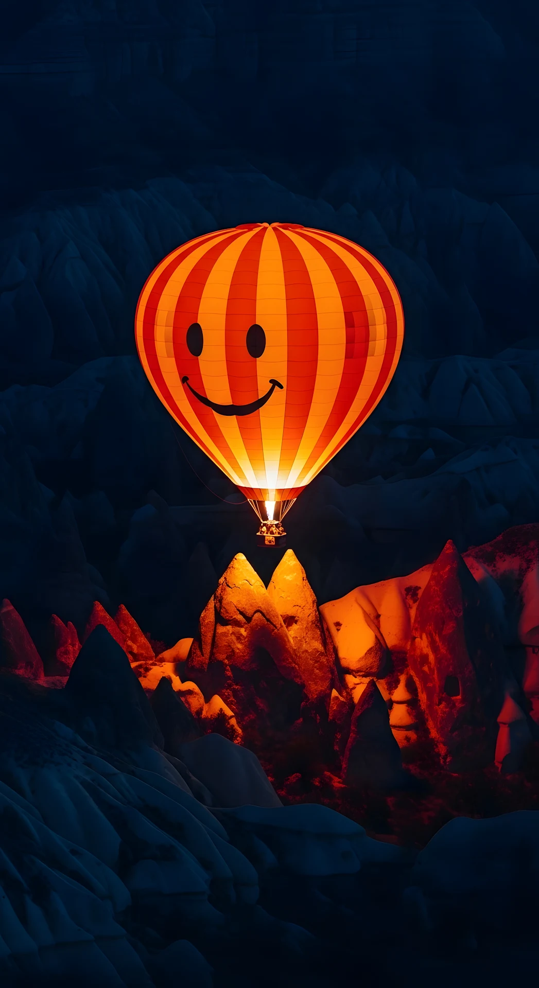 Glowing Smiley Hot Air Balloon Over Cappadocia at Night - Free 4K mobile Wallpaper