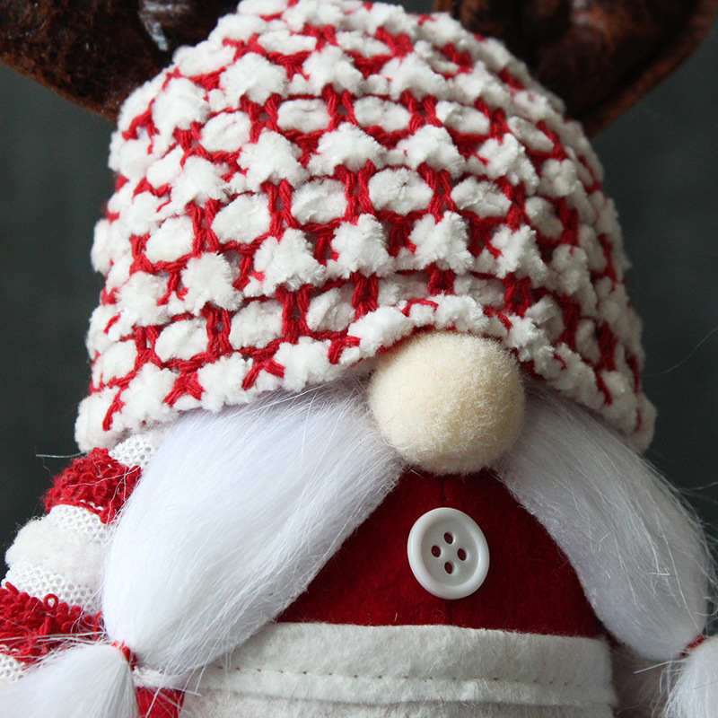Christmas gnome figure with antler hat, standing