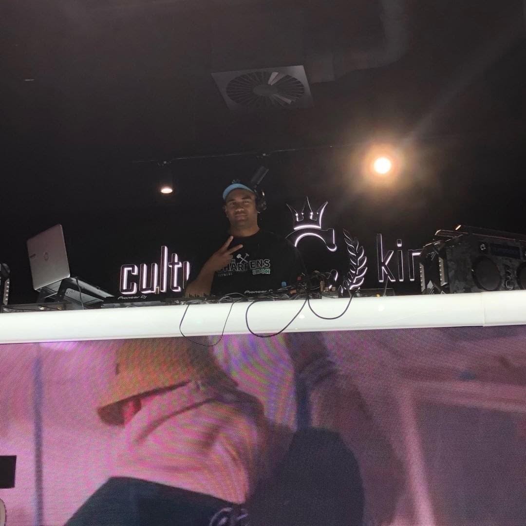 DJ Malix in the DJ booth at Culture Kings