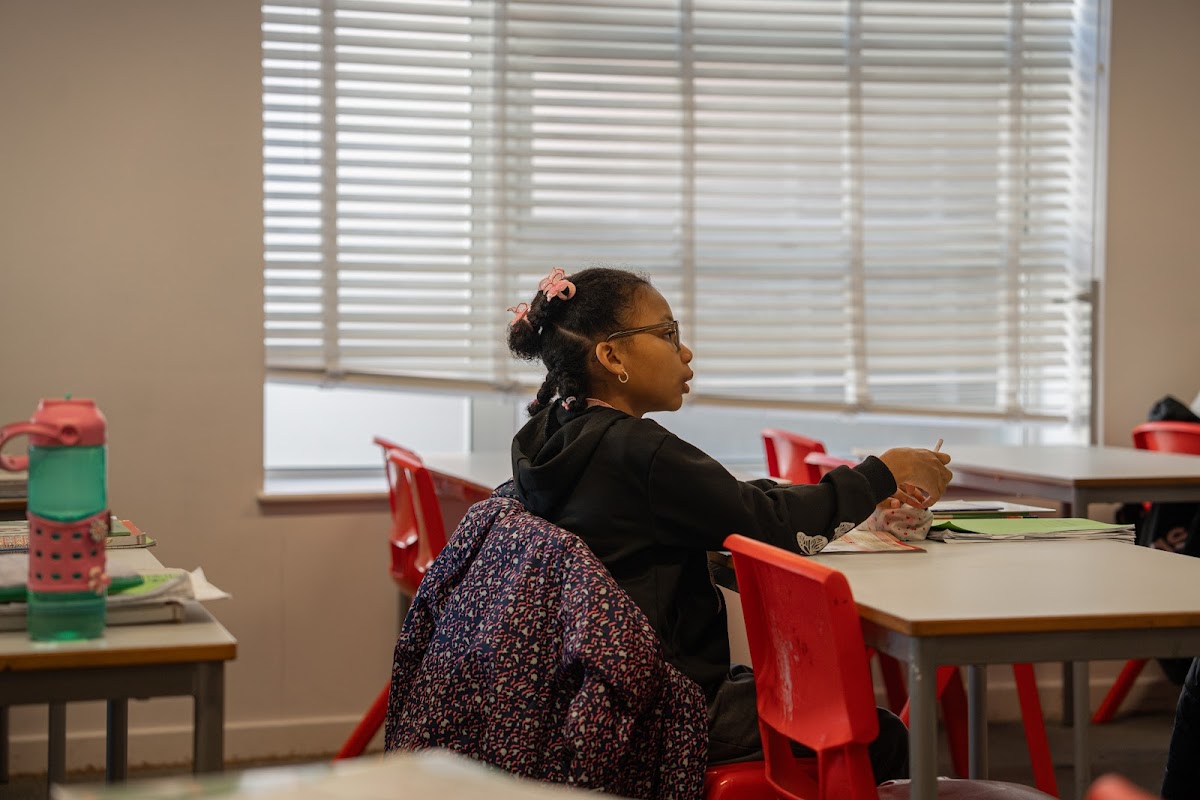 Student concentrating on her work