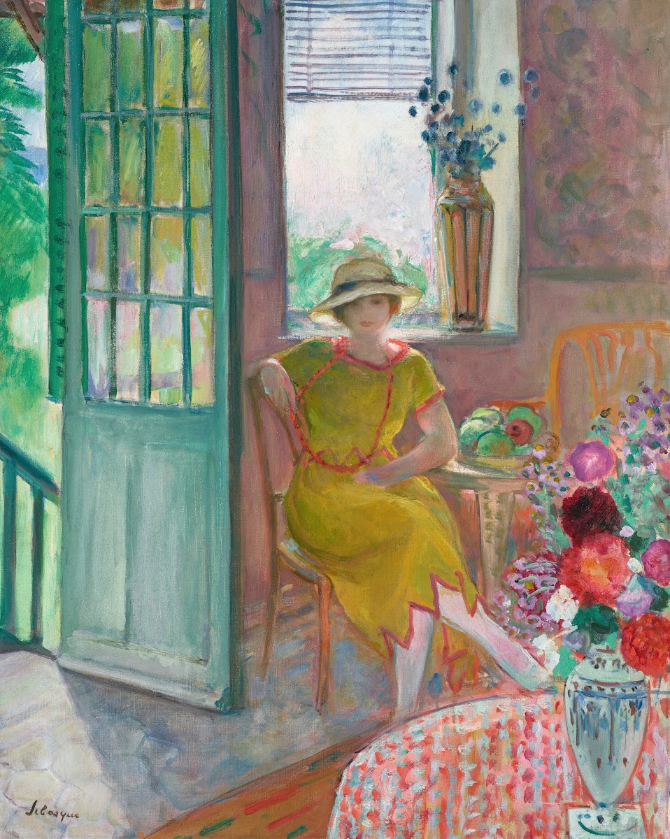 Young woman in a flowery interior 1920 1923