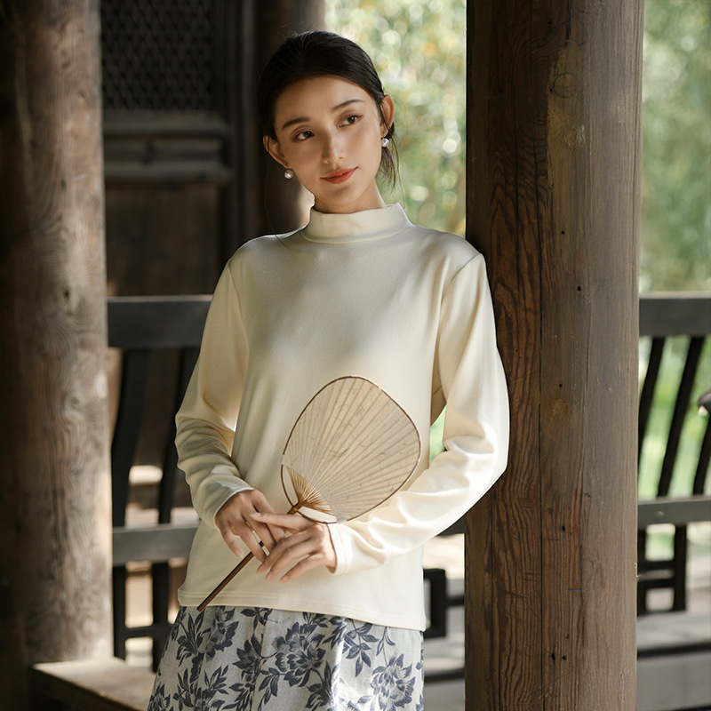 Warm knitted sweater with high collar