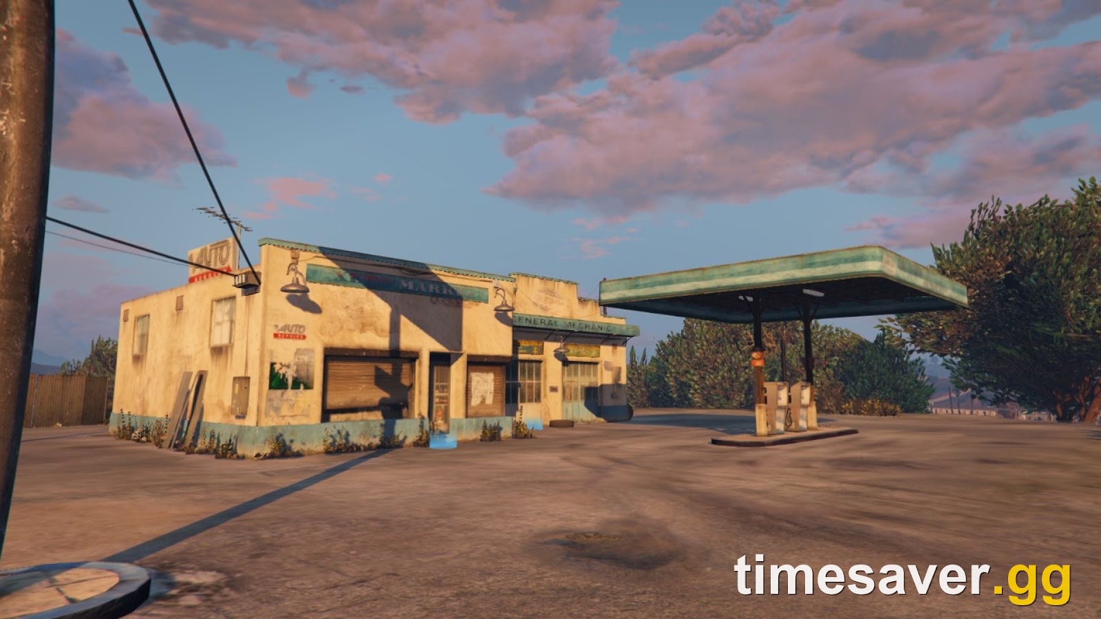 Great Chaparral Biker Clubhouse exterior in GTA Online, a weathered roadside gas station at sunset