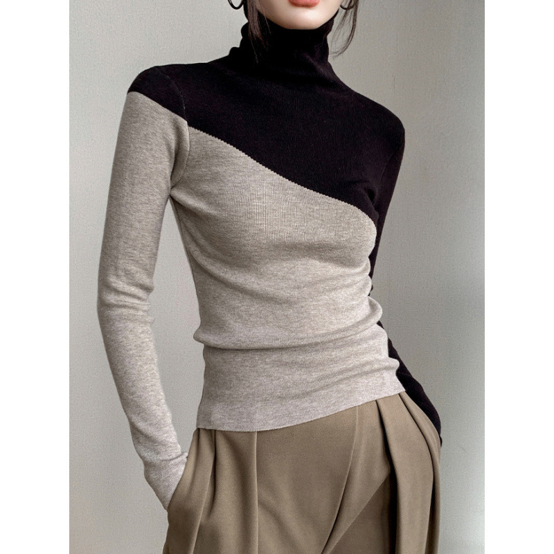 Slim knit sweater with stand-up collar and color accents