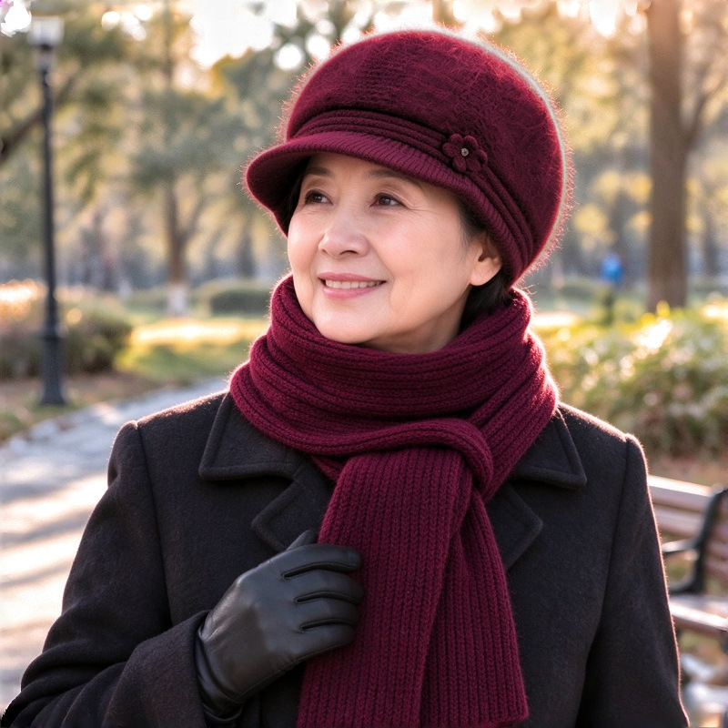 Winter knitted set for women: hat and scarf with ear protection