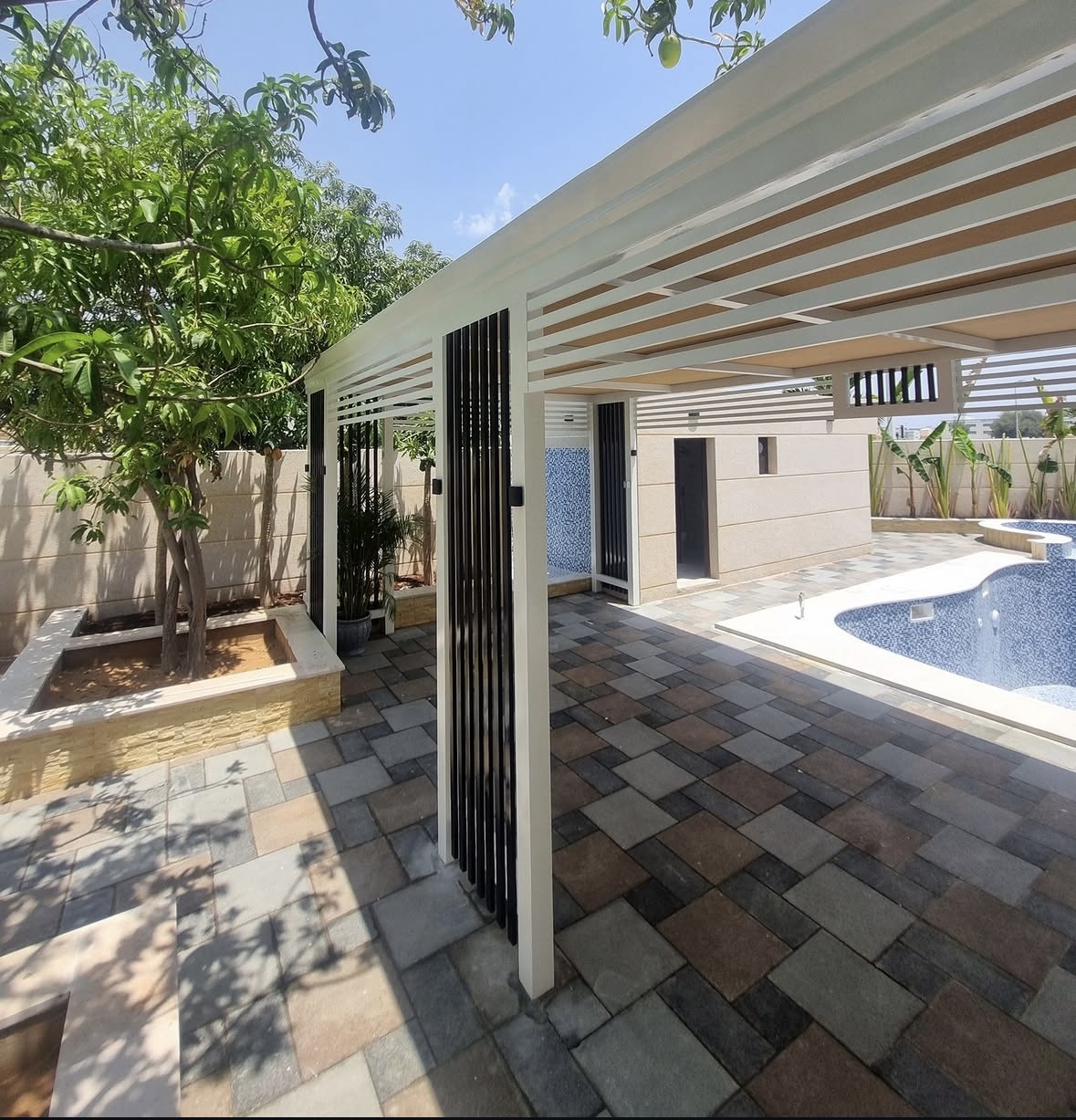 Outdoor pergola slat columns UAE — Al Taher fabrication