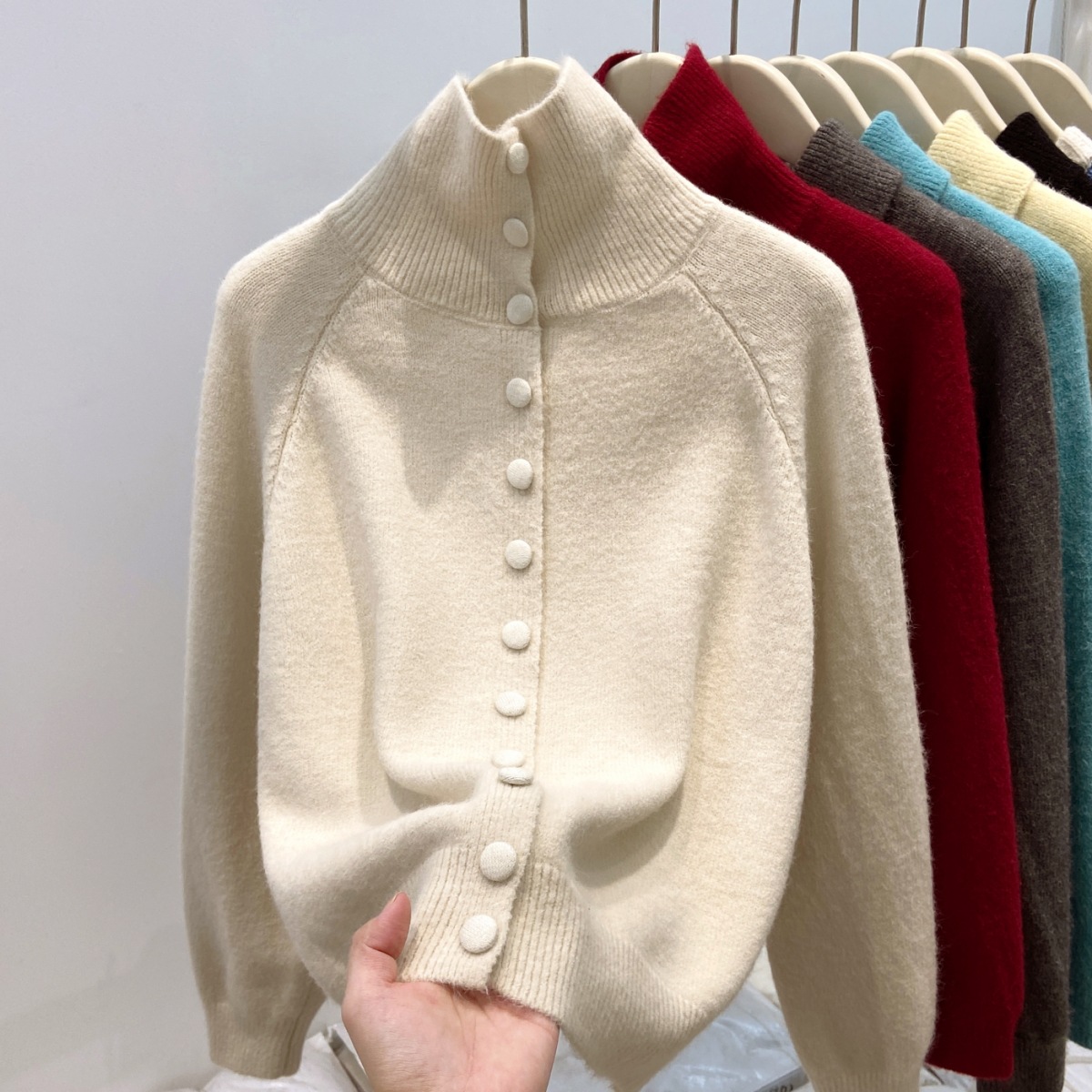 Women's cardigan with stand collar and button placket