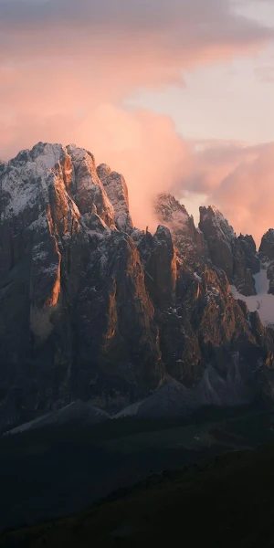 Sassolungo Mountain Range at Sunset 4K Wallpaper Background