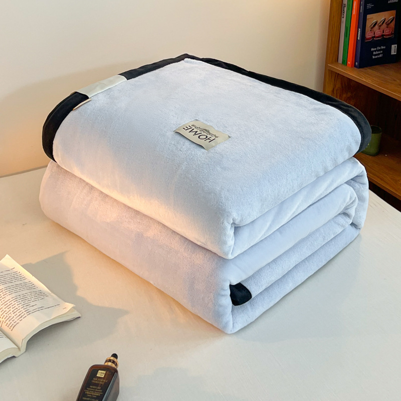 Light flannel throw blanket for on-the-go