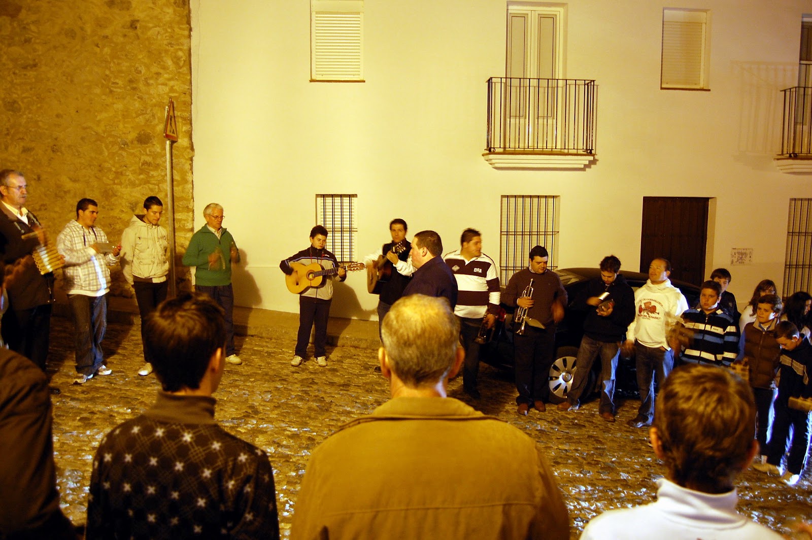 Members of Aracena’s campanillero choir gathered outdoors during the Rosario de la Aurora.