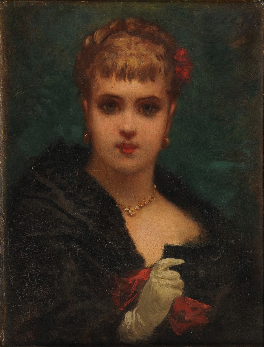 Jeune femme tenant un masque