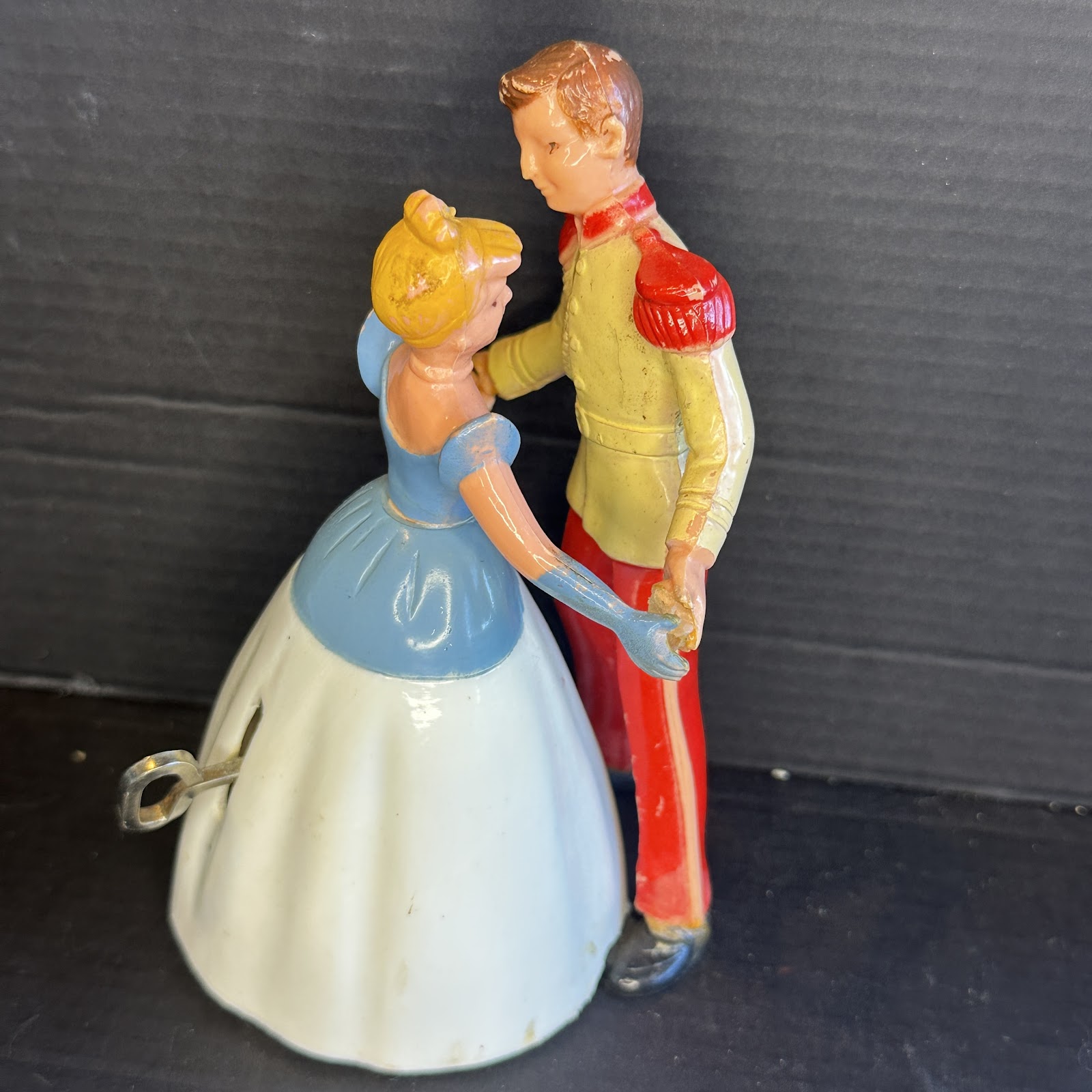 Vintage 1950s–60s Cinderella and Prince Charming mechanical dancing wind-up figurine, approximately 6.5 inches tall, Walt Disney Productions