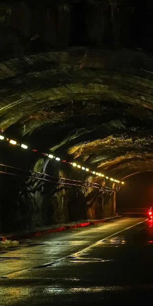 Dark Underground Stone Tunnel 5K Wallpaper Background