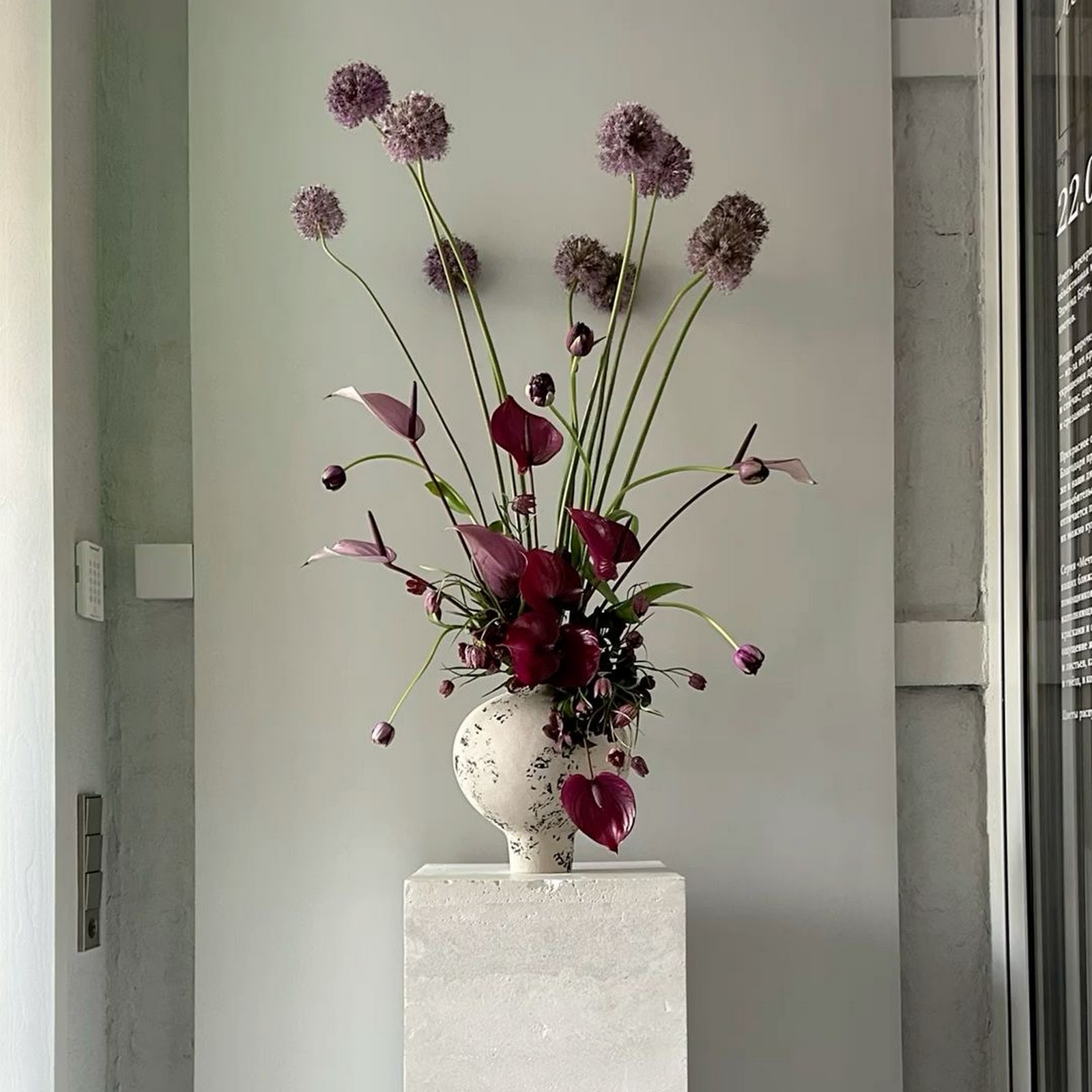Download Purple Floral Arrangement On Pedestal Full HD iPhone