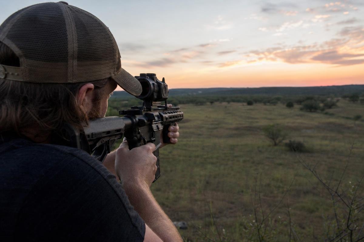 night vision vs thermal AR-15 optics for hog hunting in North Texas