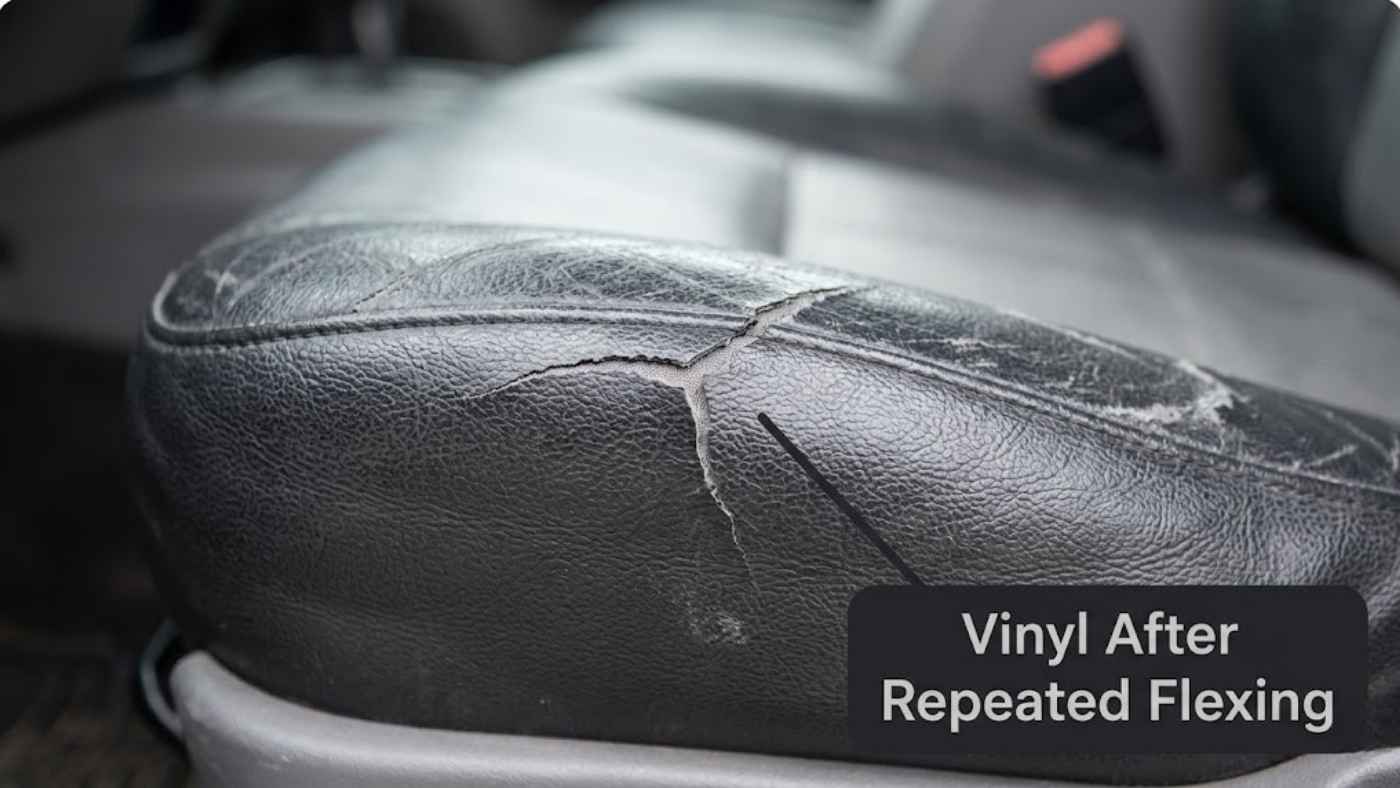 Vinyl seat cover showing surface cracking from UV exposure in a Chevrolet Silverado 1500