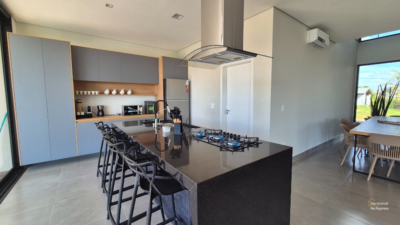 Foto 2 de Casa com 7 suítes, 2.000m² de terreno, vista para a represa à venda no Riviera de Santa Cristina XIII