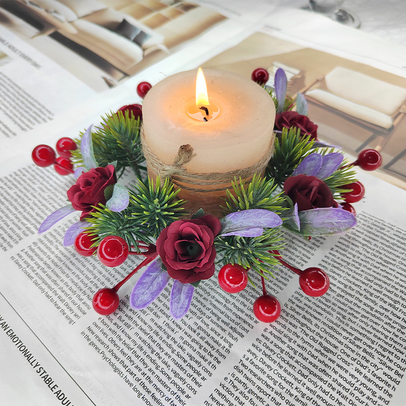 Christmas candle wreath with roses and pine needles