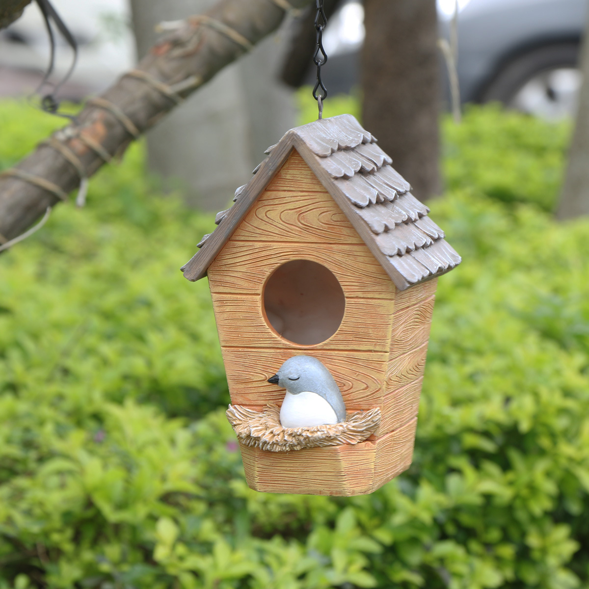Decorative birdhouse made of resin, various designs